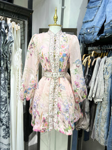 Vestido corto manga larga estamapdo floral botones de pedreria