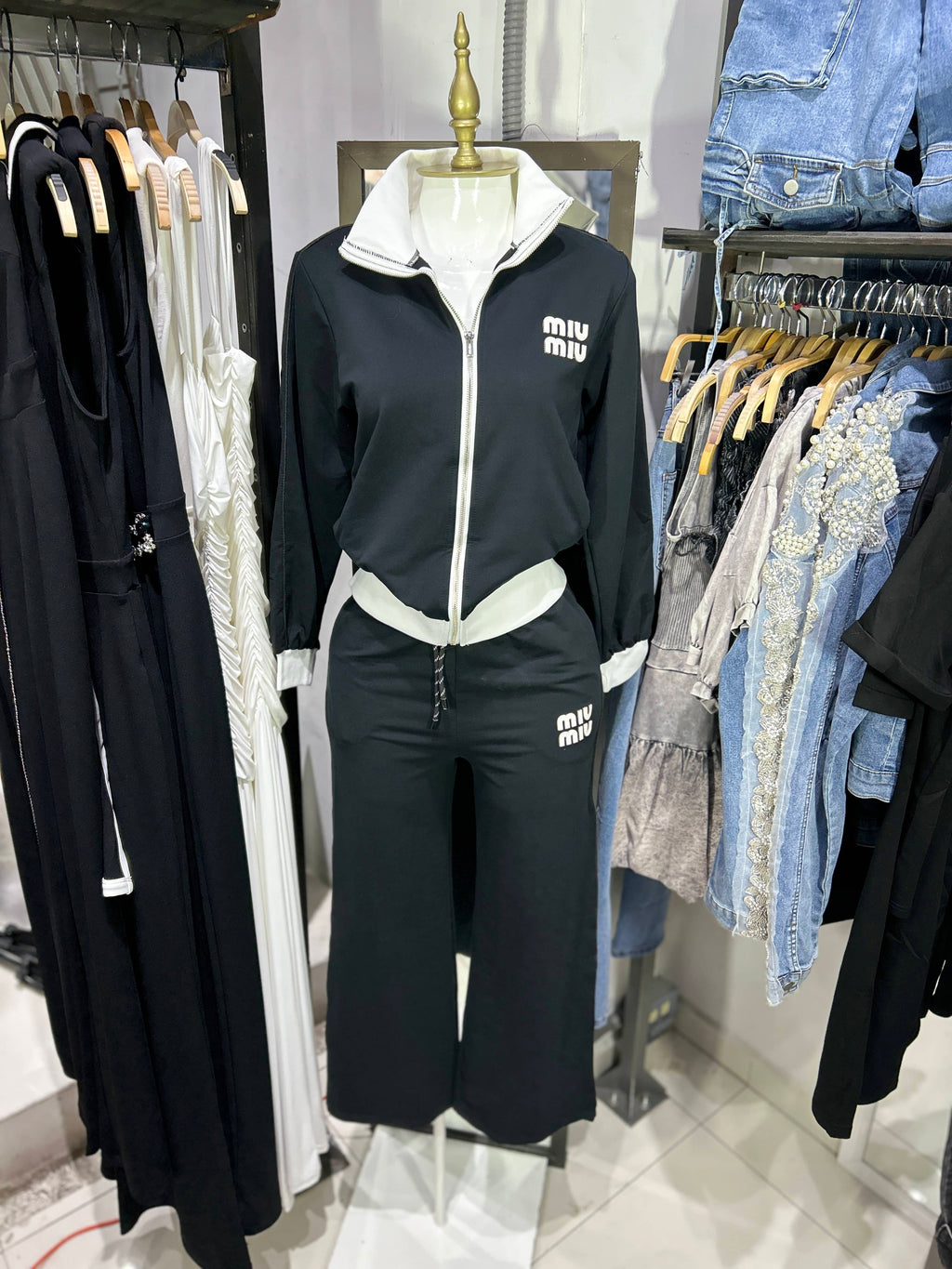 Pants negro Miu Miu franjas en contraste