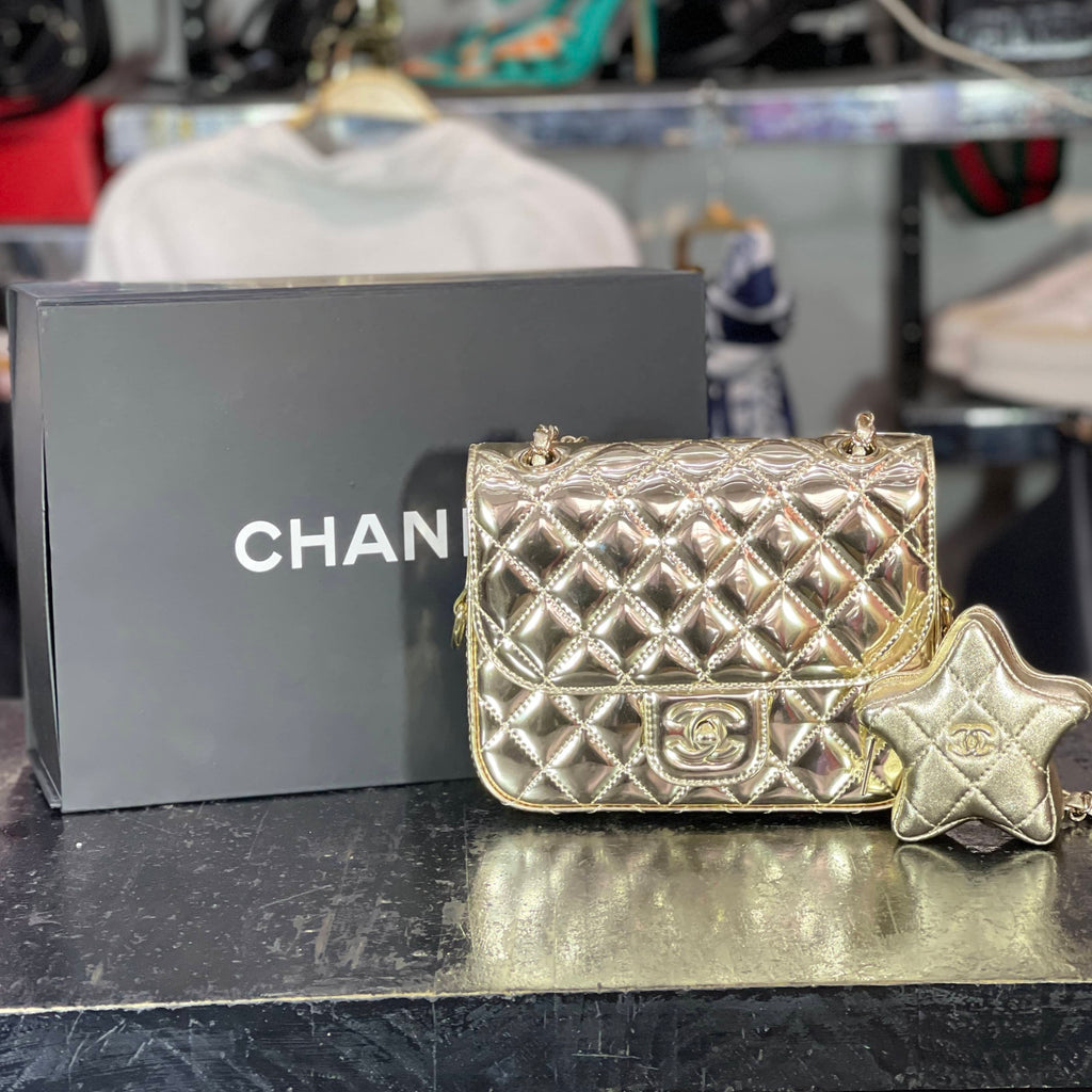 Bolso Chanel dorado mini con soloapa y monedero estrella