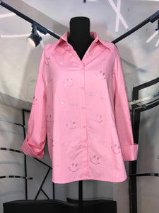 Blusa rosa camisera oversized con estampado pedreria