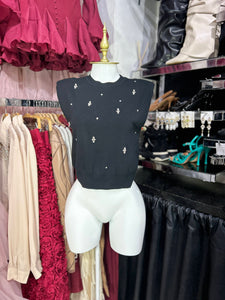 Blusa negra sin manga tela tipo sueter con pedreria